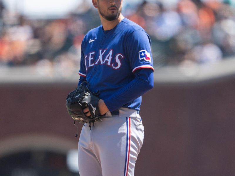 Aug 13, 2023; San Francisco, California, USA; Texas Rangers starting pitcher Dane Dunning (33) pitches during the first inning against the San Francisco Giants at Oracle Park. Mandatory Credit: Stan Szeto-USA TODAY Sports