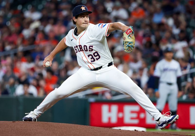 Jul 11, 2024; Houston, Texas, USA; Houston Astros starting pitcher Jake Bloss (39) pitches against the Miami Marlins in the first inning at Minute Maid Park. Mandatory Credit: Thomas Shea-USA TODAY Sports