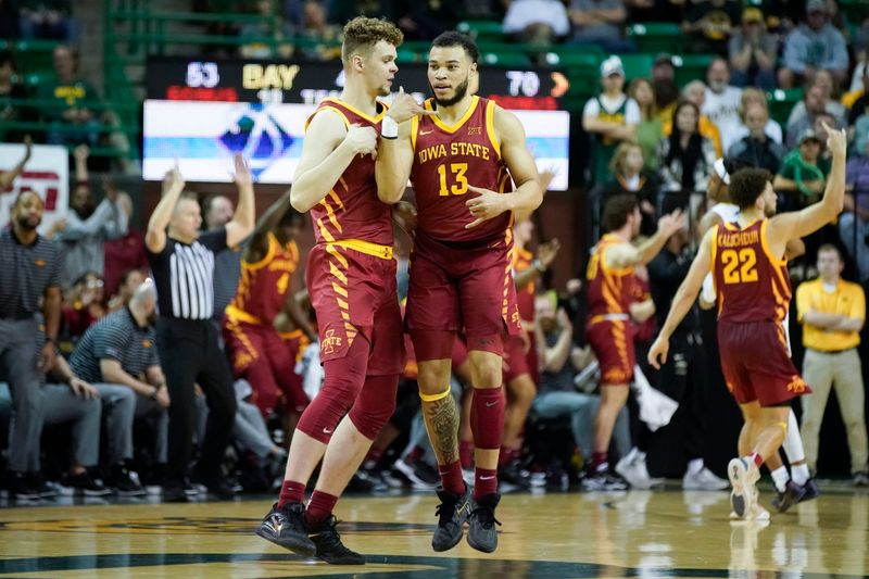 Mar 4, 2023; Waco, Texas, USA; Iowa State Cyclones forward Aljaz Kunc (5) and guard Jaren Holmes (13) react after a basket against the Baylor Bears during the second half at Ferrell Center. Mandatory Credit: Raymond Carlin III-USA TODAY Sports