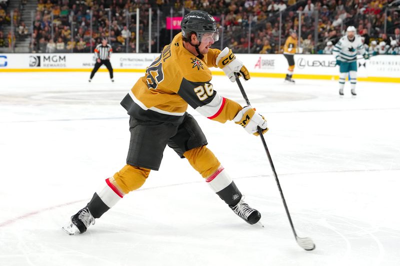 Oct 26, 2024; Las Vegas, Nevada, USA; Vegas Golden Knights right wing Alexander Holtz (26) shoots against the San Jose Sharks during the second period at T-Mobile Arena. Mandatory Credit: Stephen R. Sylvanie-Imagn Images