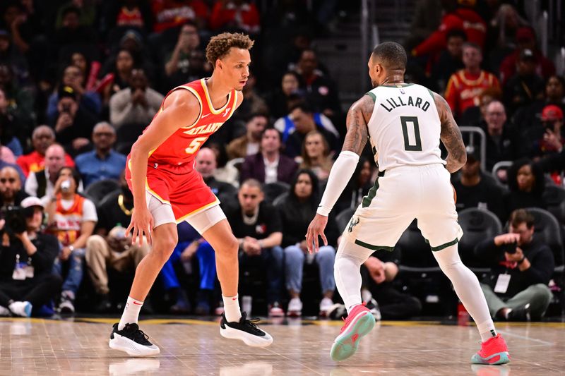 ATLANTA, GA - MARCH 4: Dyson Daniels #5 of the Atlanta Hawks plays defense during the game against the Milwaukee Bucks on March 4, 2025 at State Farm Arena in Atlanta, Georgia. NOTE TO USER: User expressly acknowledges and agrees that, by downloading and/or using this Photograph, user is consenting to the terms and conditions of the Getty Images License Agreement. Mandatory Copyright Notice: Copyright 2025 NBAE(Photo by Adam Hagy/NBAE via Getty Images)