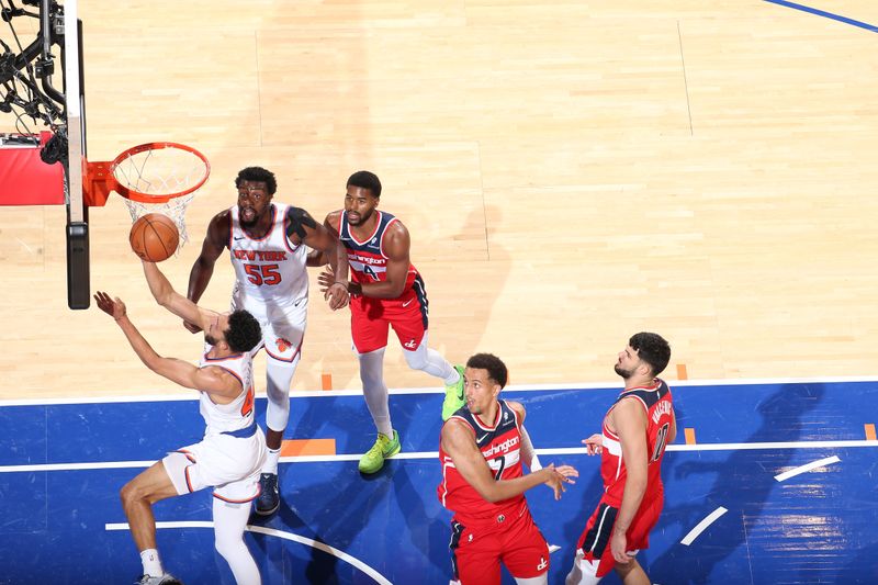 NEW YORK, NY - OCTOBER 9: Landry Shamet #44 of the New York Knicks drives to the basket during the game against the Washington Wizards during the 2024 NBA Preseason on October 9, 2024 at Madison Square Garden in New York City, New York.  NOTE TO USER: User expressly acknowledges and agrees that, by downloading and or using this photograph, User is consenting to the terms and conditions of the Getty Images License Agreement. Mandatory Copyright Notice: Copyright 2024 NBAE  (Photo by Nathaniel S. Butler/NBAE via Getty Images)