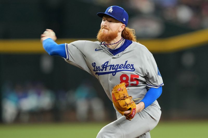 May 10, 2025; Phoenix, Arizona, USA; Los Angeles Dodgers pitcher Dustin May (85) pitches against the Arizona Diamondbacks during the first inning at Chase Field. Mandatory Credit: Joe Camporeale-Imagn Images