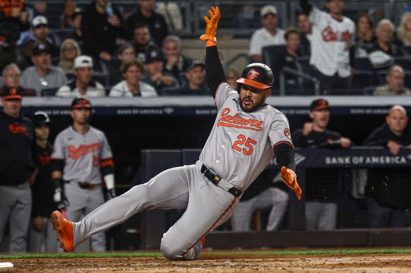 Sep 24, 2024; Bronx, New York, USA;  Baltimore Orioles right fielder Anthony Santander (25) scores a run during the fourth inning against the New York Yankees at Yankee Stadium. Mandatory Credit: Vincent Carchietta-Imagn Images