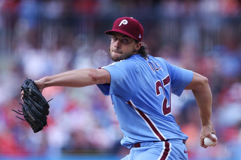 Jul 11, 2024; Philadelphia, Pennsylvania, USA; Philadelphia Phillies pitcher Aaron Nola (27) throws a pitch during the second inning against the Los Angeles Dodgers at Citizens Bank Park. Mandatory Credit: Bill Streicher-USA TODAY Sports