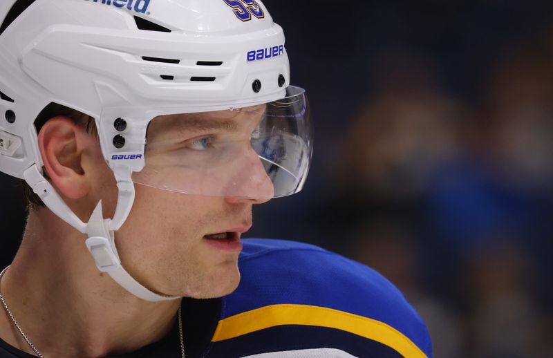 Nov 14, 2024; Buffalo, New York, USA;  St. Louis Blues defenseman Colton Parayko (55) waits for the face-off during the second period against the Buffalo Sabres at KeyBank Center. Mandatory Credit: Timothy T. Ludwig-Imagn Images