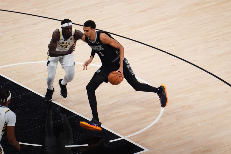 SAN ANTONIO, TX - MARCH 3:  Victor Wembanyama #1 of the San Antonio Spurs dribbles the ball during the game against the Indiana Pacers on March 3, 2024 at the AT&T Center in San Antonio, Texas. NOTE TO USER: User expressly acknowledges and agrees that, by downloading and or using this photograph, user is consenting to the terms and conditions of the Getty Images License Agreement. Mandatory Copyright Notice: Copyright 2024 NBAE (Photos by Cooper Neill/NBAE via Getty Images)