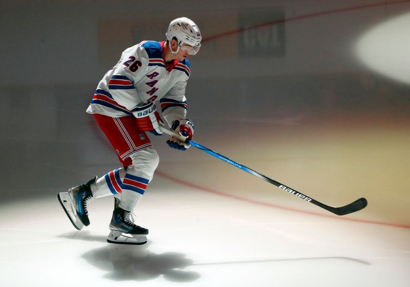 Nov 22, 2023; Pittsburgh, Pennsylvania, USA; New York Rangers left wing Jimmy Vesey (26) takes the ice to warms up before the game against the Pittsburgh Penguins at PPG Paints Arena. Mandatory Credit: Charles LeClaire-USA TODAY Sports