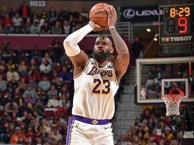 CLEVELAND, OH - NOVEMBER 25: LeBron James #23 of the Los Angeles Lakers three point basket during the game against the Cleveland Cavaliers on November 25, 2023 at Rocket Mortgage FieldHouse in Cleveland, Ohio. NOTE TO USER: User expressly acknowledges and agrees that, by downloading and/or using this Photograph, user is consenting to the terms and conditions of the Getty Images License Agreement. Mandatory Copyright Notice: Copyright 2023 NBAE (Photo by David Liam Kyle/NBAE via Getty Images)