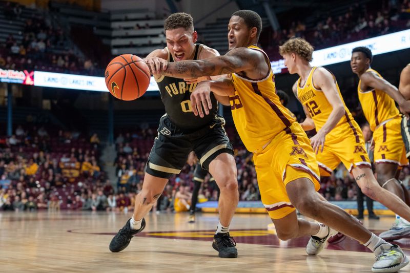 Jan 19, 2023; Minneapolis, Minnesota, USA; Minnesota Golden Gophers guard Ta'lon Cooper (55) steals the ball from Purdue Boilermakers forward Mason Gillis (0) in the second half at Williams Arena. Mandatory Credit: Matt Blewett-USA TODAY Sports