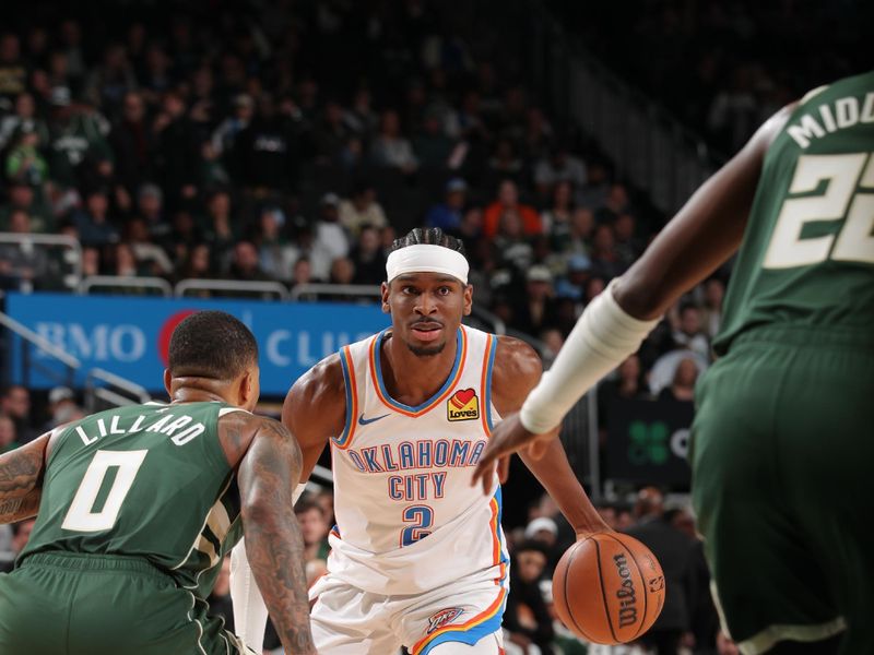 MILWAUKEE, WI - MARCH 24: Shai Gilgeous-Alexander #2 of the Oklahoma City Thunder handles the ball during the game against the Milwaukee Bucks on March 24, 2024 at the Fiserv Forum Center in Milwaukee, Wisconsin. NOTE TO USER: User expressly acknowledges and agrees that, by downloading and or using this Photograph, user is consenting to the terms and conditions of the Getty Images License Agreement. Mandatory Copyright Notice: Copyright 2024 NBAE (Photo by Gary Dineen/NBAE via Getty Images).