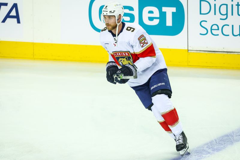 Dec 14, 2024; Calgary, Alberta, CAN; Florida Panthers center Sam Bennett (9) skates during the warmup period against the Calgary Flames at Scotiabank Saddledome. Mandatory Credit: Sergei Belski-Imagn Images