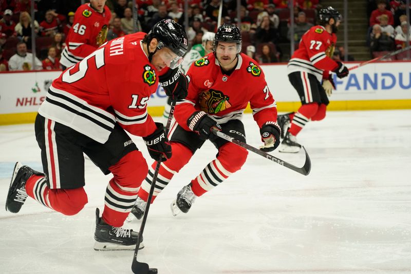 Nov 27, 2024; Chicago, Illinois, USA; Chicago Blackhawks center Craig Smith (15) skate with the puck against the Dallas Stars during the second period at United Center. Mandatory Credit: David Banks-Imagn Images