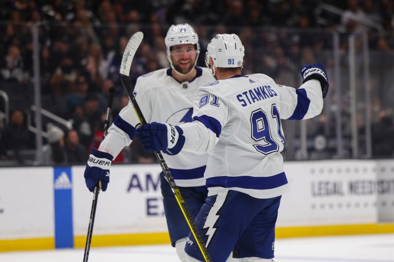 Mar 23, 2024; Los Angeles, California, USA; Tampa Bay Lighting center Steven Stamkos (91) celebrates with Tampa Bay Lighting defensemen Victor Hedman (77) after Stamkos scores a goal during the third period against the Los Angeles Kings at Crypto.com Arena. Mandatory Credit: Yannick Peterhans-USA TODAY Sports