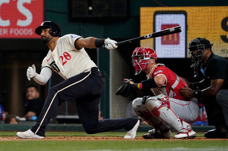 Sep 6, 2024; Arlington, Texas, USA; Texas Rangers third baseman Ezequiel Duran (20) single during the second inning against the Los Angeles Angels at Globe Life Field. Mandatory Credit: Raymond Carlin III-Imagn Images