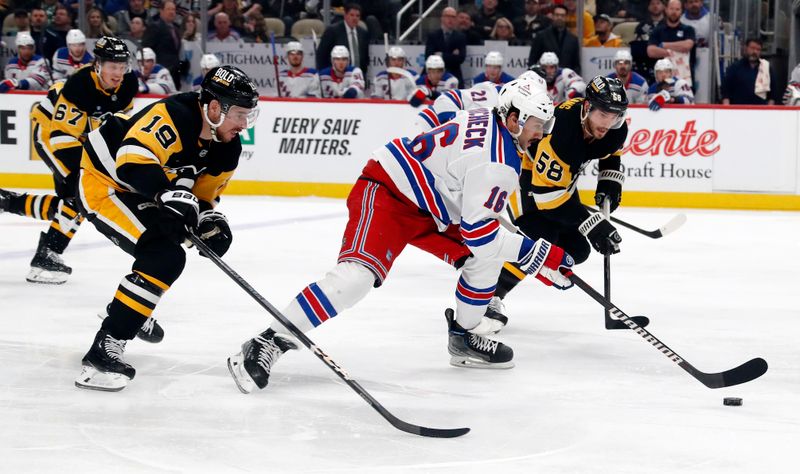 Mar 16, 2024; Pittsburgh, Pennsylvania, USA;  New York Rangers center Vincent Trocheck (16) skates up ice with the puck as Pittsburgh Penguins right wing Reilly Smith (19) and defenseman Kris Letang (58) chase during the second period at PPG Paints Arena. Mandatory Credit: Charles LeClaire-USA TODAY Sports