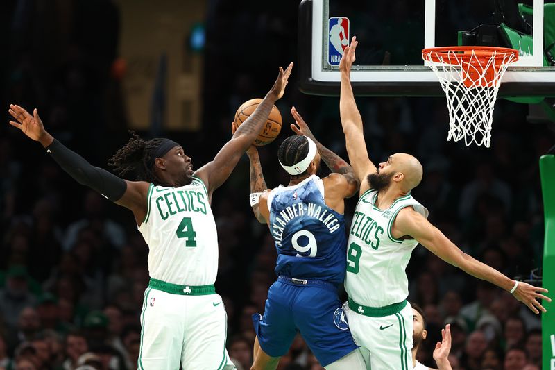 BOSTON, MASSACHUSETTS - JANUARY 10: Jrue Holiday #4 and Derrick White #9 of the Boston Celtics defend a shot from Nickeil Alexander-Walker #9 of the Minnesota Timberwolves  at TD Garden on January 10, 2024 in Boston, Massachusetts. The Celtics defeat the Timberwolves 127-120 in overtime. NOTE TO USER: User expressly acknowledges and agrees that, by downloading and or using this photograph, user is consenting to the terms and conditions of the Getty Images License Agreement.  (Photo by Maddie Meyer/Getty Images)