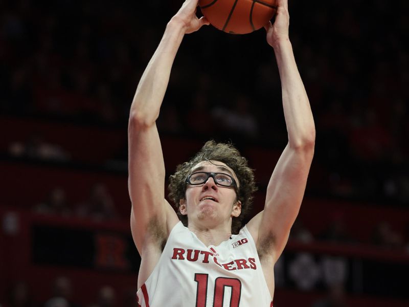 Nov 10, 2023; Piscataway, New Jersey, USA; Rutgers Scarlet Knights guard Gavin Griffiths (10) does up for a dunk during the second half against the Boston University Terriers at Jersey Mike's Arena. Mandatory Credit: Vincent Carchietta-USA TODAY Sports