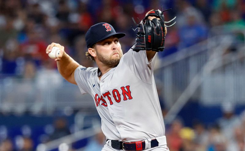 Jul 2, 2024; Miami, Florida, USA;  Boston Red Sox starting pitcher Kutter Crawford (50) throws against the Miami Marlins in the first inning at loanDepot Park. Mandatory Credit: Rhona Wise-USA TODAY Sports