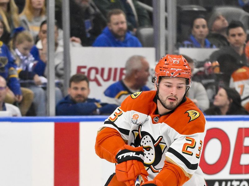Dec 1, 2025; St. Louis, Missouri, USA; Anaheim Ducks center Mason McTavish (23) controls the puck against the St. Louis Blues during the third period at Enterprise Center. Mandatory Credit: Jeff Curry-Imagn Images
