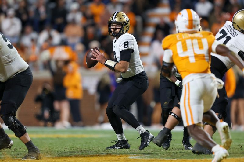 Nov 25, 2023; Knoxville, Tennessee, USA; Vanderbilt Commodores quarterback Ken Seals (8) drops back to pass the ball against the Tennessee Volunteers during the second half at Neyland Stadium. Mandatory Credit: Randy Sartin-USA TODAY Sports