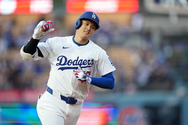 Apr 29, 2025; Los Angeles, California, USA; Los Angeles Dodgers designated hitter Shohei Ohtani (17) celebrates after hitting a home run during the first inning against the Miami Marlins at Dodger Stadium. Mandatory Credit: Kirby Lee-Imagn Images