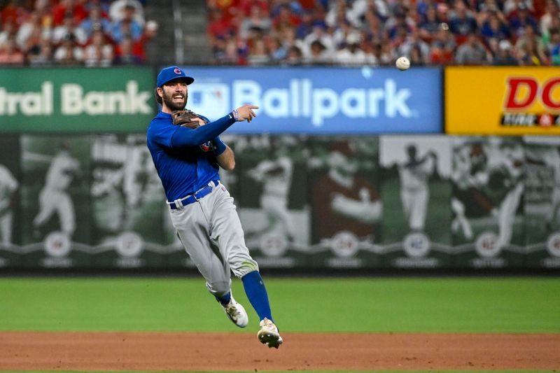 Jul 28, 2023; St. Louis, Missouri, USA;  Chicago Cubs shortstop Dansby Swanson (7) throws on the run against the St. Louis Cardinals during the seventh inning at Busch Stadium. Mandatory Credit: Jeff Curry-USA TODAY Sports