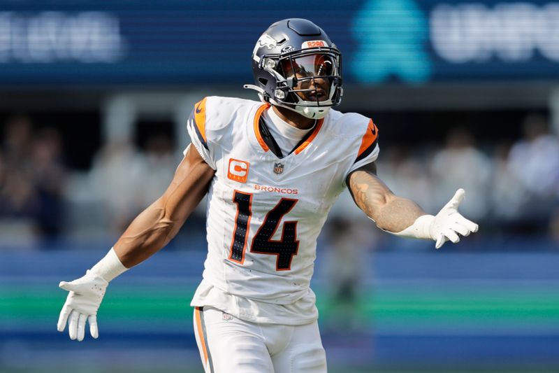 Denver Broncos wide receiver Courtland Sutton (14) reacts to a call during the second half of an NFL football game against the Seattle Seahawks, Sunday, Sept. 8, 2024, in Seattle. (AP Photo/John Froschauer)