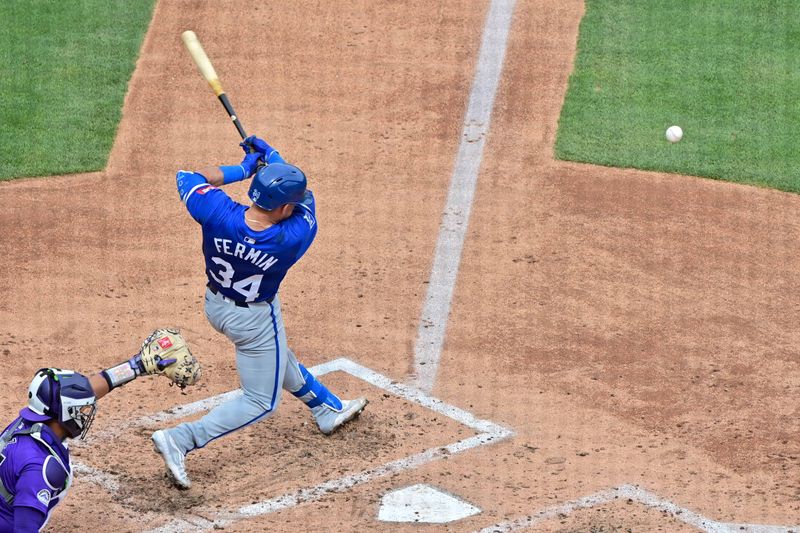 Mar 12, 2024; Salt River Pima-Maricopa, Arizona, USA;  Kansas City Royals catcher Freddy Fermin (34) grounds out in the third inning against the Colorado Rockies during a spring training game at Salt River Fields at Talking Stick. Mandatory Credit: Matt Kartozian-USA TODAY Sports