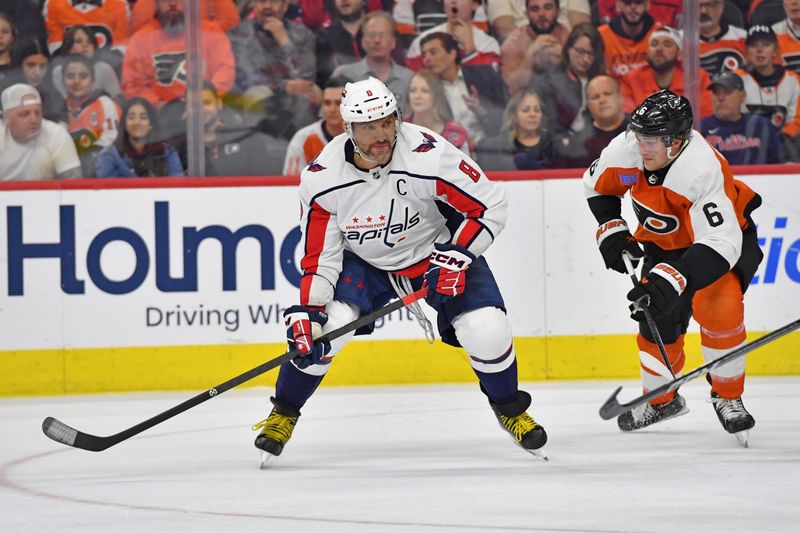 Apr 16, 2024; Philadelphia, Pennsylvania, USA; Washington Capitals left wing Alex Ovechkin (8) is defended by Philadelphia Flyers defenseman Travis Sanheim (6) during the third period at Wells Fargo Center. Mandatory Credit: Eric Hartline-USA TODAY Sports