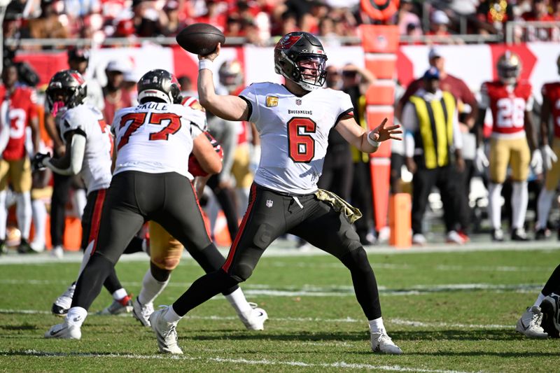 Tampa Bay Buccaneers quarterback Baker Mayfield (6) passes against the San Francisco 49ers during the second half of an NFL football game in Tampa, Fla., Sunday, Nov. 10, 2024. (AP Photo/Jason Behnken)