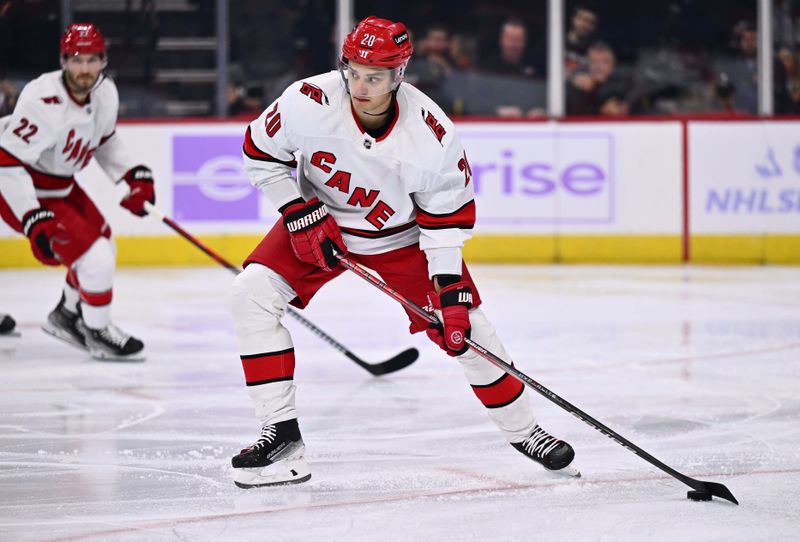 Nov 28, 2023; Philadelphia, Pennsylvania, USA; Carolina Hurricanes center Sebastian Aho (20) controls the puck against the Philadelphia Flyers in the second period at Wells Fargo Center. Mandatory Credit: Kyle Ross-USA TODAY Sports