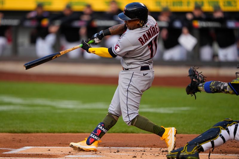 May 21, 2023; New York City, New York, USA; Cleveland Guardians third baseman Jose Ramirez (11) hits a home run against the New York Mets during the first inning at Citi Field. Mandatory Credit: Gregory Fisher-USA TODAY Sports