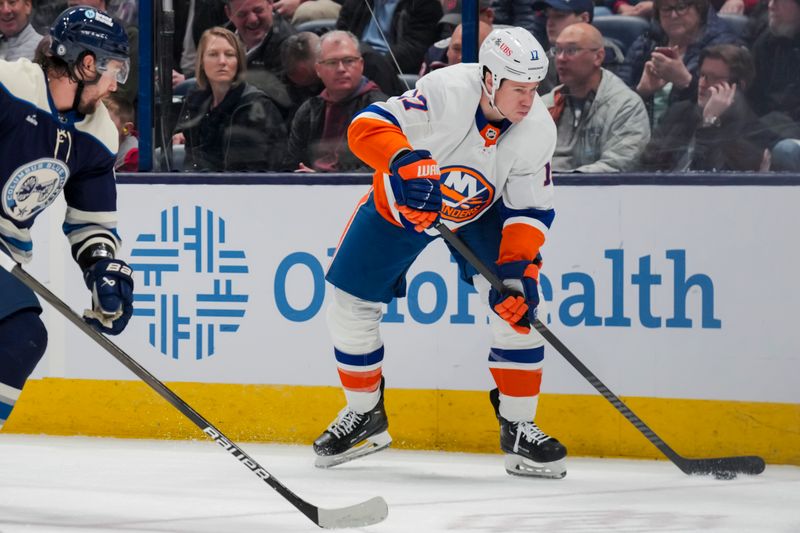 Apr 4, 2024; Columbus, Ohio, USA;  New York Islanders left wing Matt Martin (17) skates with the puck against the Columbus Blue Jackets in the second period at Nationwide Arena. Mandatory Credit: Aaron Doster-USA TODAY Sports