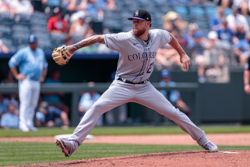 Jun 4, 2023; Kansas City, Missouri, USA; Colorado Rockies assistant hitting coach Andy Gonzalez (21) pitches during the fifth inning against the Kansas City Royals at Kauffman Stadium. Mandatory Credit: William Purnell-USA TODAY Sports