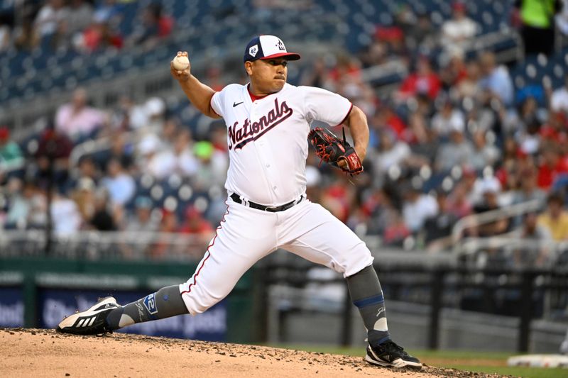 Apr 15, 2023; Washington, District of Columbia, USA; Washington Nationals relief pitcher Erasmo Ramirez (61) throws to the Cleveland Guardians during the fifth inning at Nationals Park. Mandatory Credit: Brad Mills-USA TODAY Sports