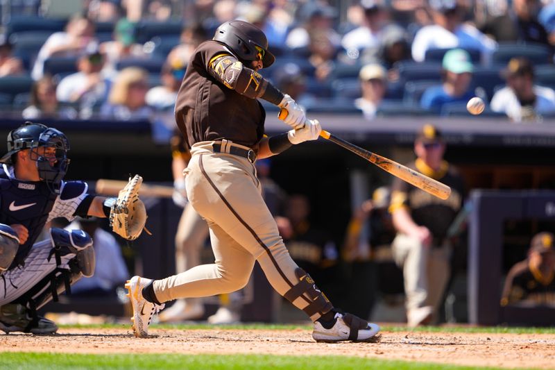 May 28, 2023; Bronx, New York, USA; San Diego Padres second baseman Rougned Odor (24) hits a two-run home run against the New York Yankees during the seventh inning at Yankee Stadium. Mandatory Credit: Gregory Fisher-USA TODAY Sports