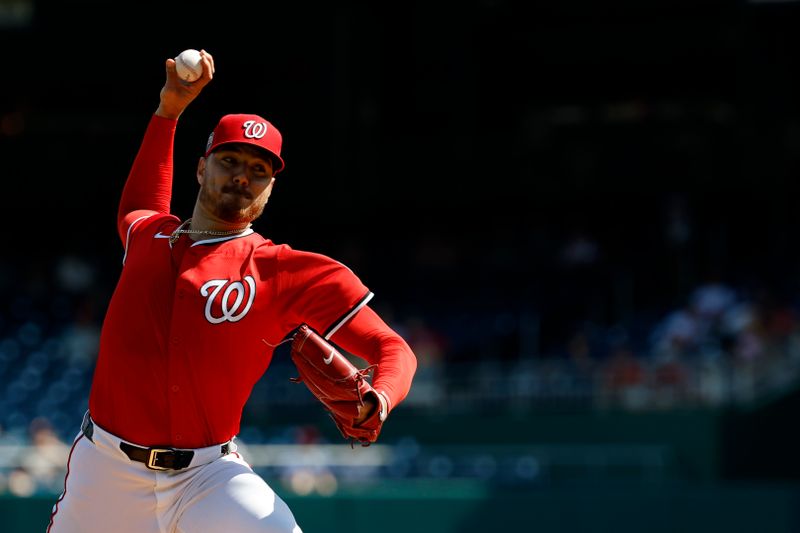 Sep 14, 2025; Washington, District of Columbia, USA; Washington Nationals starting pitcher Cade Cavalli (24) pitches against the Pittsburgh Pirates during the first inning at Nationals Park. Mandatory Credit: Geoff Burke-Imagn Images