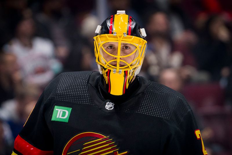 Dec 7, 2023; Vancouver, British Columbia, CAN; Vancouver Canucks goalie Casey DeSmith (29) during a stop in play against the Minnesota Wild in the second period at Rogers Arena. Mandatory Credit: Bob Frid-USA TODAY Sports