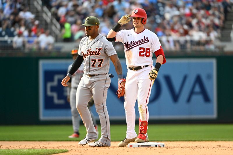 May 20, 2023; Washington, District of Columbia, USA; Washington Nationals right fielder Lane Thomas (28) reacts after hitting a double against the Detroit Tigers during the eighth inning at Nationals Park. Mandatory Credit: Brad Mills-USA TODAY Sports