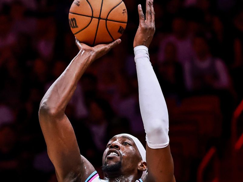 MIAMI, FLORIDA - JANUARY 29: Bam Adebayo #13 of the Miami Heat shoots the ball against the Cleveland Cavaliers during the first half at Kaseya Center on January 29, 2025 in Miami, Florida.  NOTE TO USER: User expressly acknowledges and agrees that, by downloading and or using this Photograph, user is consenting to the terms and conditions of the Getty Images License Agreement. (Photo by Carmen Mandato/Getty Images)