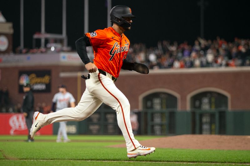 Aug 9, 2024; San Francisco, California, USA; San Francisco Giants left fielder Michael Conforto (8) scores the winning run on a sacrifice fly by Mark Canha against the Detroit Tigers during the ninth inning at Oracle Park. Mandatory Credit: D. Ross Cameron-USA TODAY Sports