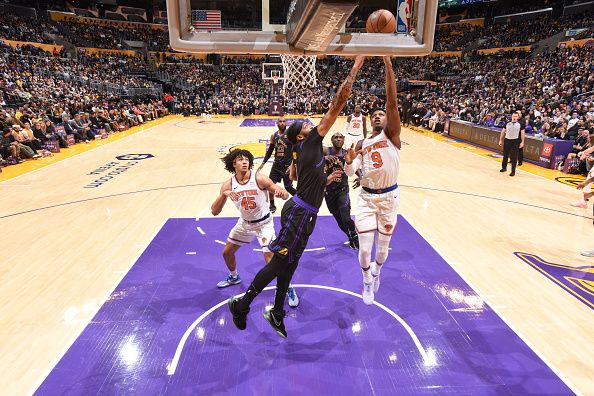 LOS ANGELES, CA - DECEMBER 18:  RJ Barrett #9 of the New York Knicks goes to the basket during the game on December 18, 2023 at Crypto.Com Arena in Los Angeles, California. NOTE TO USER: User expressly acknowledges and agrees that, by downloading and/or using this Photograph, user is consenting to the terms and conditions of the Getty Images License Agreement. Mandatory Copyright Notice: Copyright 2023 NBAE (Photo by Adam Pantozzi/NBAE via Getty Images)