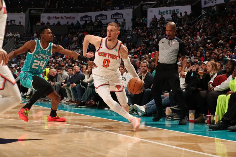 CHARLOTTE, NC - JANUARY 29: Donte Divincenzo #0 of the New York Knicks handles the ball during the game against the Charlotte Hornets on January 29, 2024 at Spectrum Center in Charlotte, North Carolina. NOTE TO USER: User expressly acknowledges and agrees that, by downloading and or using this photograph, User is consenting to the terms and conditions of the Getty Images License Agreement. Mandatory Copyright Notice: Copyright 2024 NBAE (Photo by Kent Smith/NBAE via Getty Images)