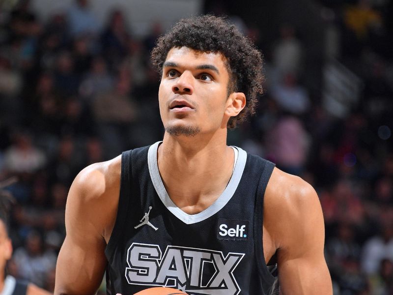 SAN ANTONIO, TX - JANUARY 27: Dominick Barlow #26 of the San Antonio Spurs shoots a free throw during the game against the Minnesota Timberwolves on January 27, 2024 at the Frost Bank Center in San Antonio, Texas. NOTE TO USER: User expressly acknowledges and agrees that, by downloading and or using this photograph, user is consenting to the terms and conditions of the Getty Images License Agreement. Mandatory Copyright Notice: Copyright 2024 NBAE (Photos by Michael Gonzales/NBAE via Getty Images)