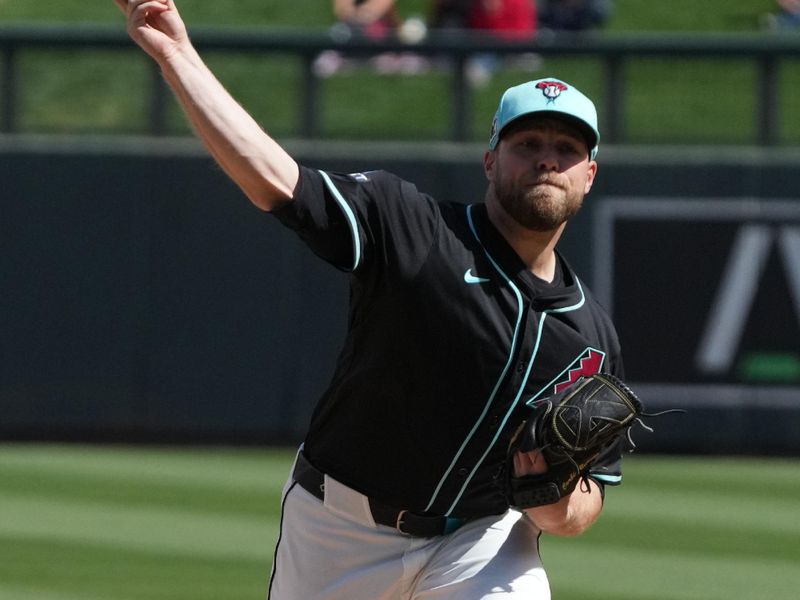 Mar 3, 2025; Salt River Pima-Maricopa, Arizona, USA; Arizona Diamondbacks pitcher Corbin Burnes (39) throws against the Chicago Cubs in the first inning at Salt River Fields at Talking Stick. Mandatory Credit: Rick Scuteri-Imagn Images