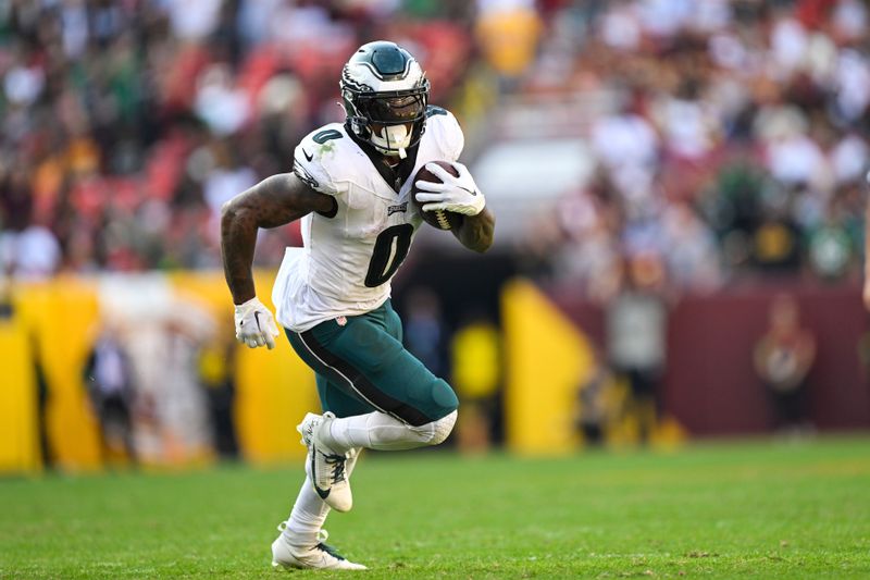 Philadelphia Eagles running back D'Andre Swift (0) runs the ball during the second half of an NFL football game against the Washington Commanders, Sunday, Oct. 29, 2023, in Landover, Md. (AP Photo/Terrance Williams)