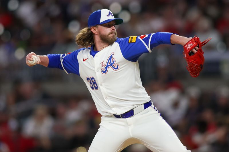 Aug 24, 2024; Atlanta, Georgia, USA; Atlanta Braves relief pitcher Pierce Johnson (38) throws against the Washington Nationals in the ninth inning at Truist Park. Mandatory Credit: Brett Davis-USA TODAY Sports