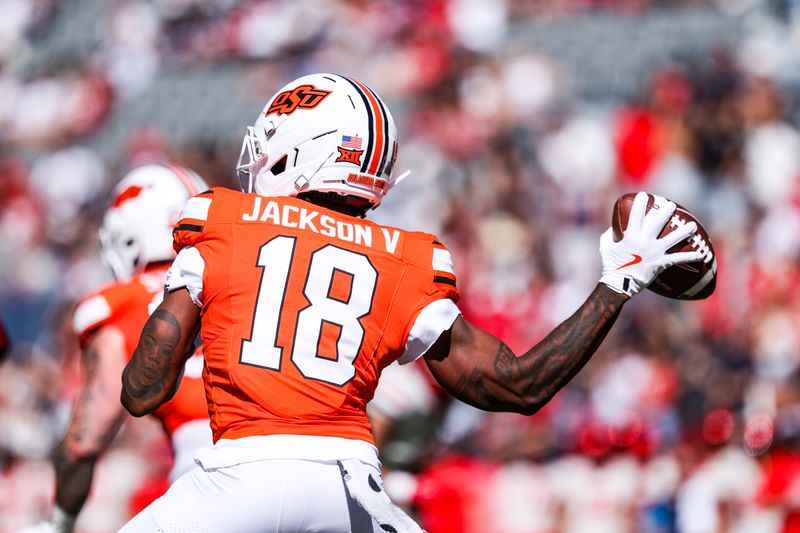Oct 4, 2025; Tucson, Arizona, USA; Oklahoma State Cowboys wide receiver Sam Jackson V (18) throws the ball during the third quarter of the game against the Arizona Wildcats at Arizona Stadium. Mandatory Credit: Aryanna Frank-Imagn Images