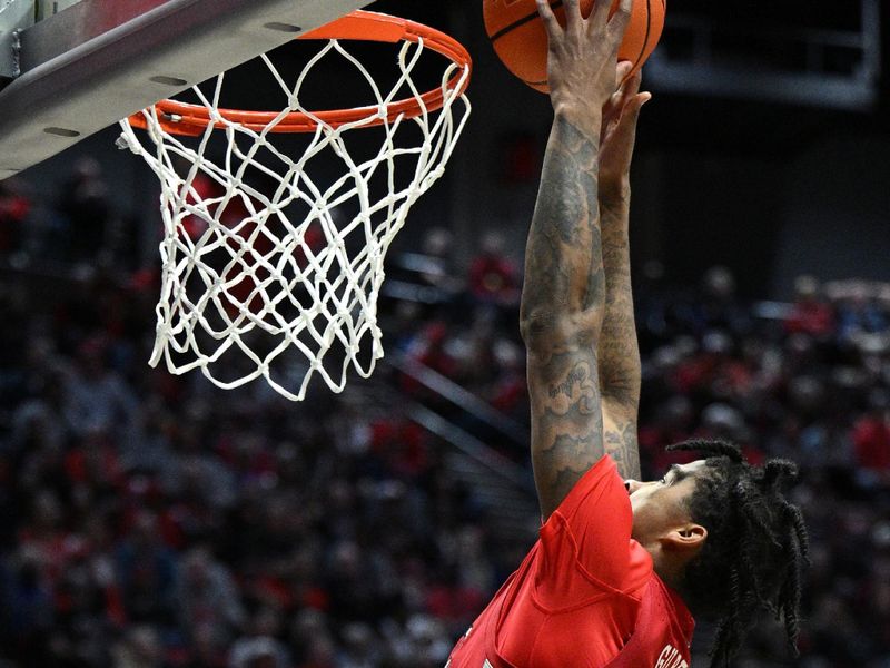 Feb 11, 2023; San Diego, California, USA; UNLV Rebels guard Keshon Gilbert (10) dunks the ball during the second half against the San Diego State Aztecs at Viejas Arena. Mandatory Credit: Orlando Ramirez-USA TODAY Sports